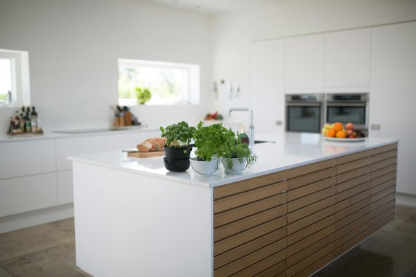 Essential Tips for Keeping Your Wooden Kitchen Cabinets Pristine in the UK